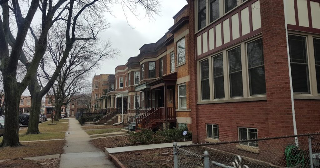 a Midwest neighborhood photo taken from the sidewalk