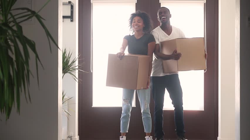 young couple moves into new home